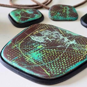 In this post I show how   to cover polymer clay with air dry clay to make over a piece that I wasn't happy with. 