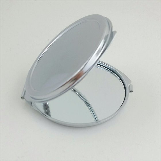 Mirror Compact